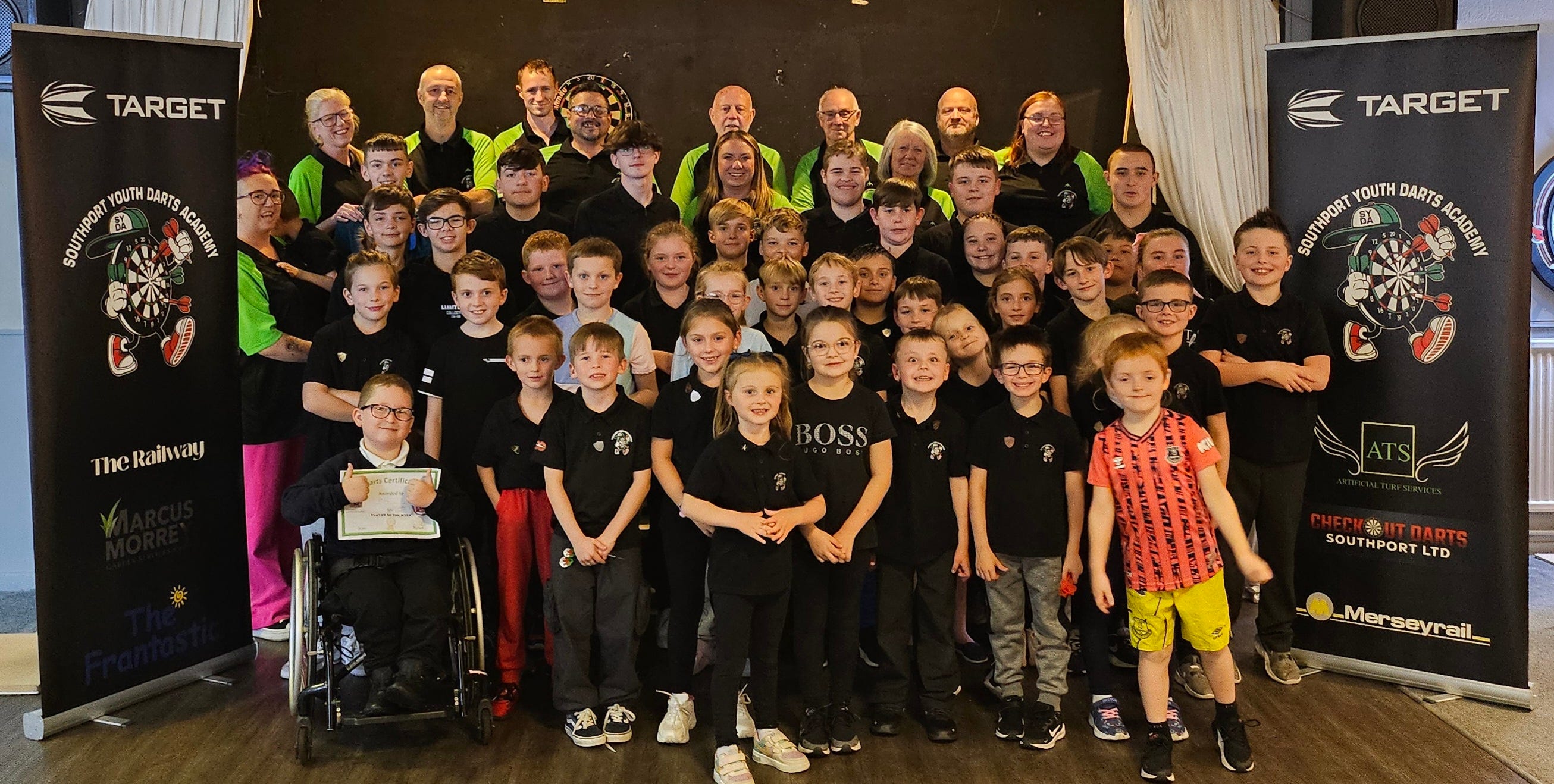 Blackburn Youth darts players enjoying a competitive match