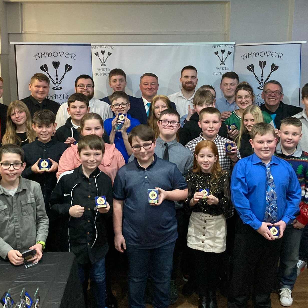 Andover Darts Academy youth players celebrating becoming an Elite 1 affiliated academy