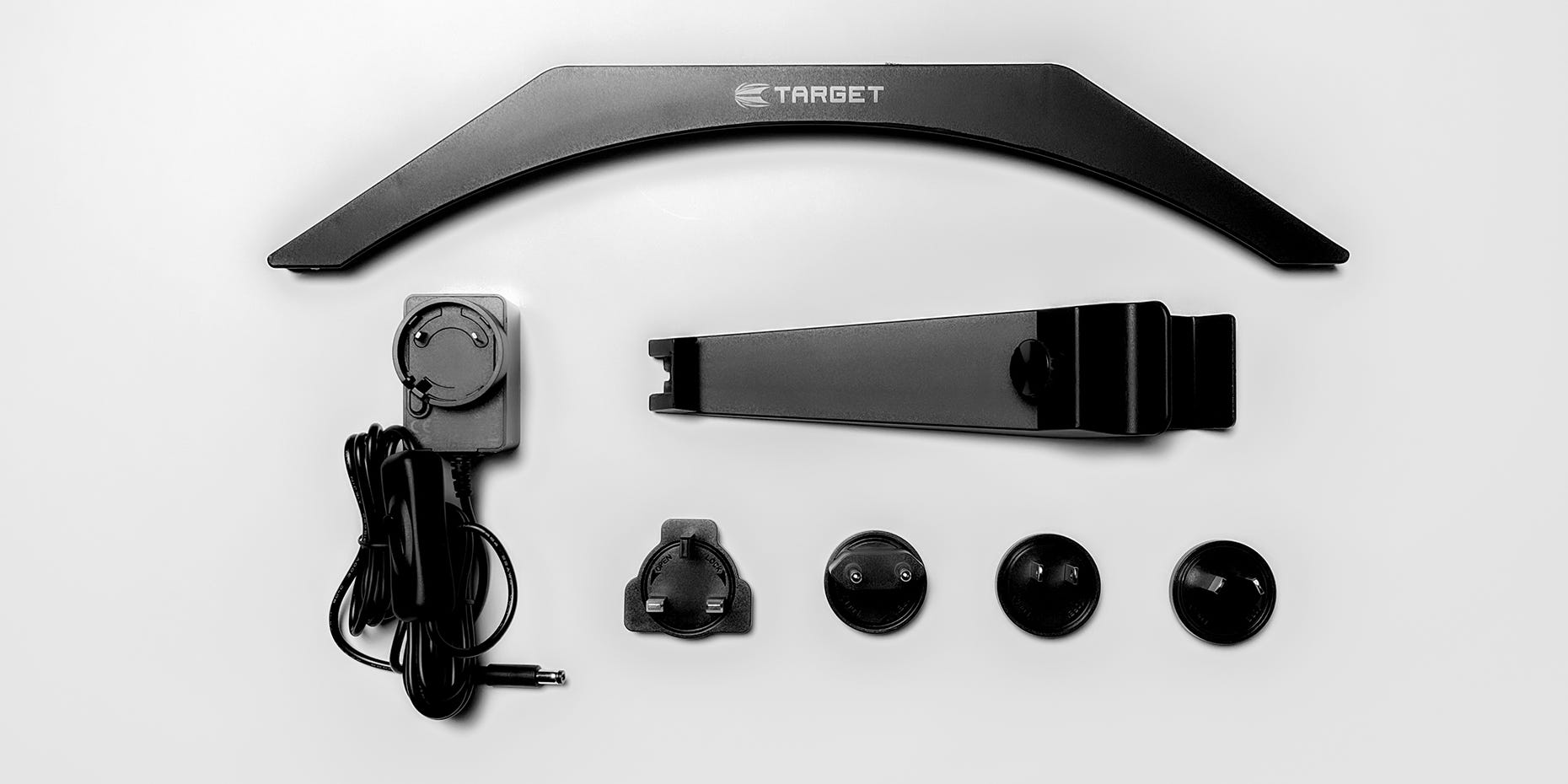 The Arc Dartboard Light comes with the light, bracket, 3 metre power cable, and 4 power adapters.