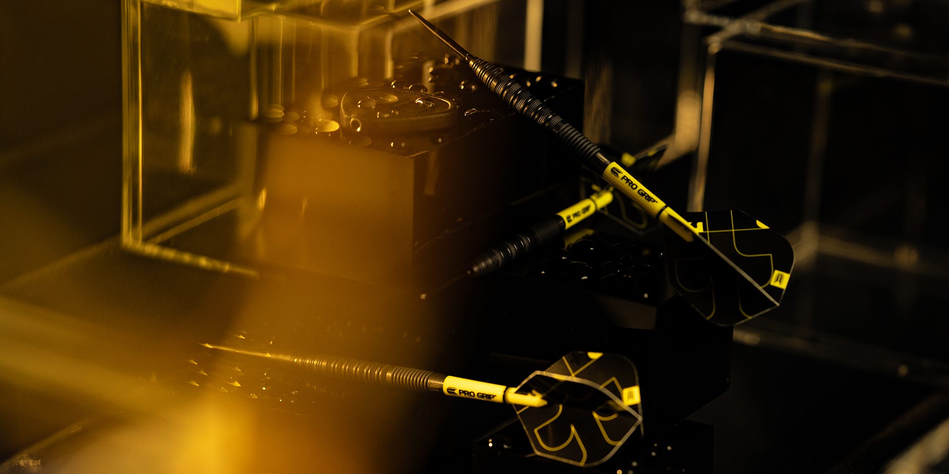 Bolide Void 01 SP dart set laid alongside the included Swiss Point Tool.