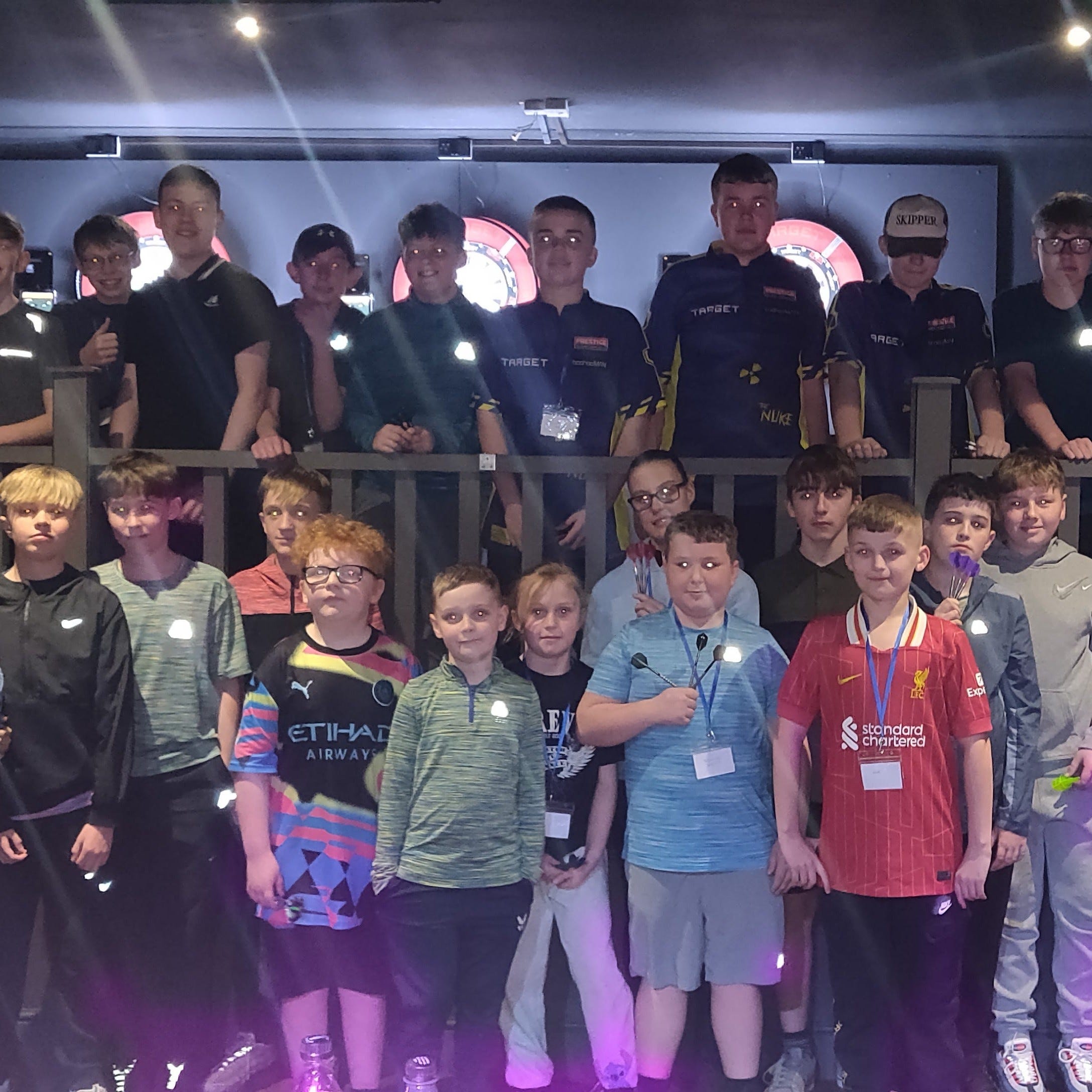 Grimsby Junior Darts Academy players posing for photo