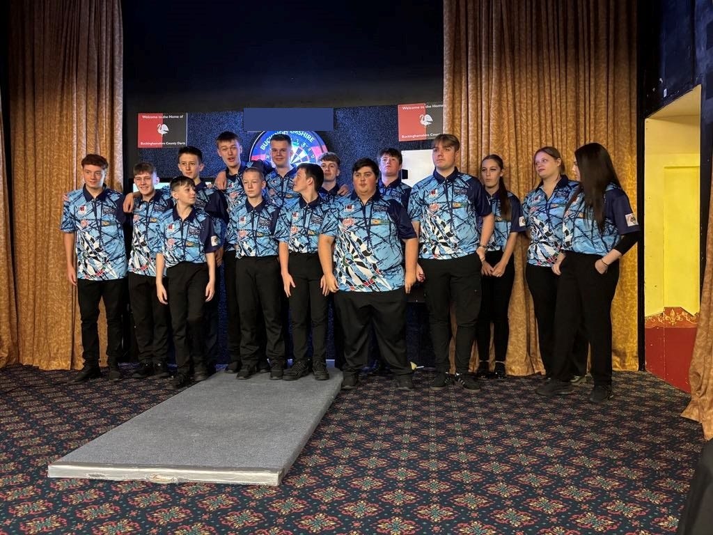 Blackburn Youth darts players enjoying a competitive match