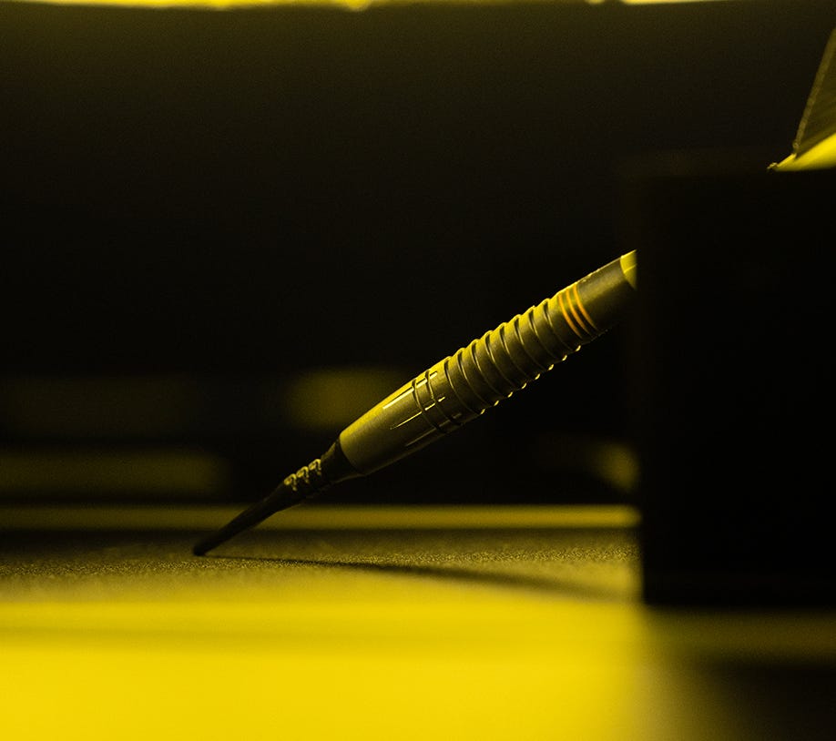 Close-up view of the Scott Williams Black soft tip dart.