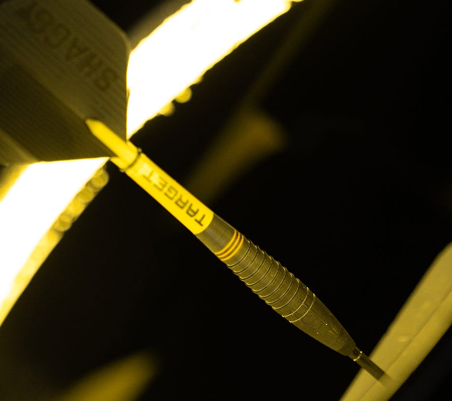 Close-up view of the Scott Williams Black steel tip dart.