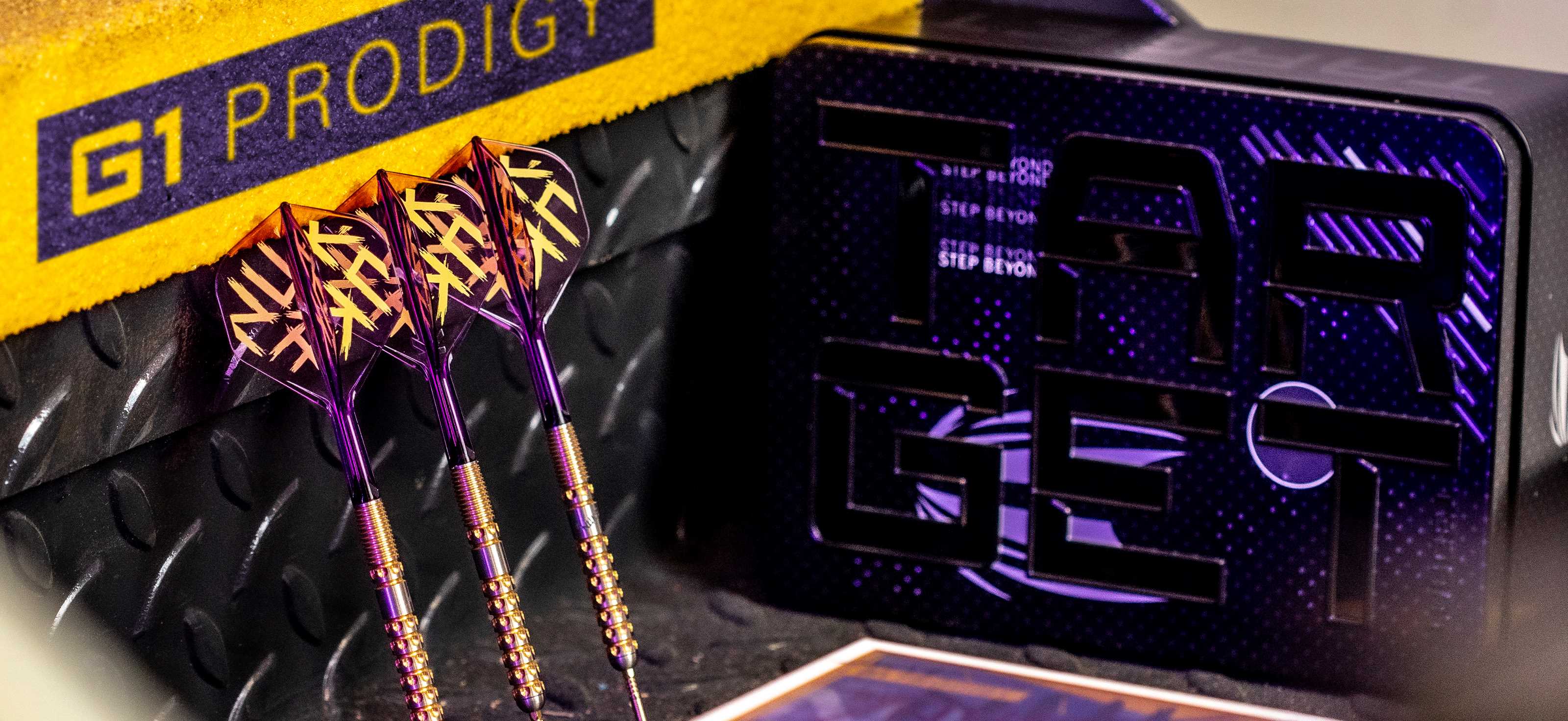 The Luke Littler G1 Prodigy dart set with the presentation tin.